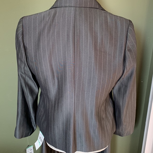 Beautiful pinstripe suit, BNWT, purchased from Macy’s, Size 8P, Color is slate. - Picture 14 of 16